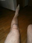 a view of my legs, hairy but certainly not bad, with heels
