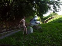 I show myself naked away from a small road